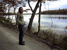 Paul standing by a lake